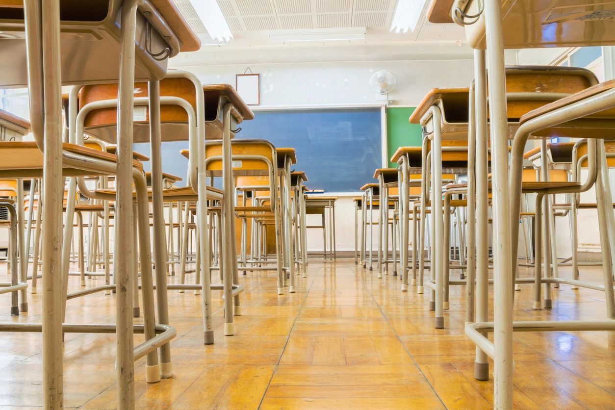 Classroom with desks and chairs.